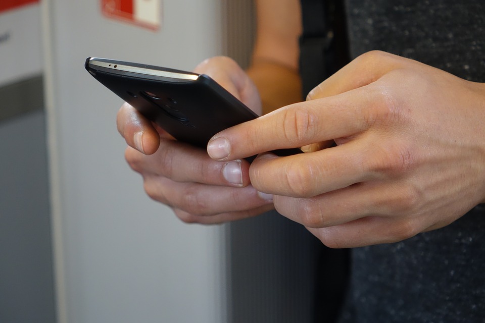 man using a smartphone