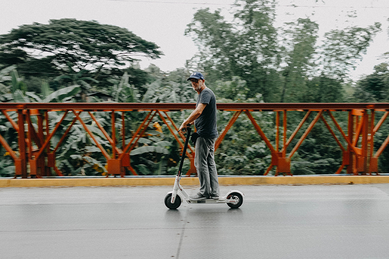 riding a scooter